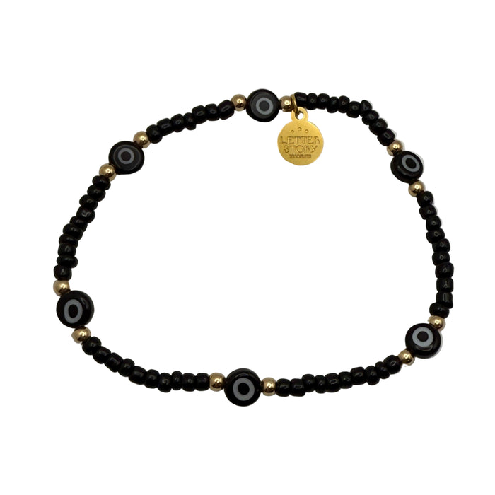 BLACK EVIL EYE & 14K GOLD FILLED SPACER BRACELET